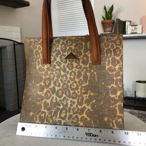 Authentic Spadacini leopard print leather handbag